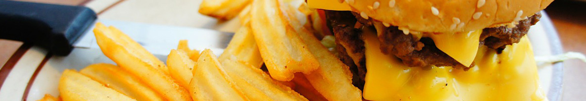 Eating Burger Irish Pub Food at Conroy's Public House restaurant in Overland Park, KS.